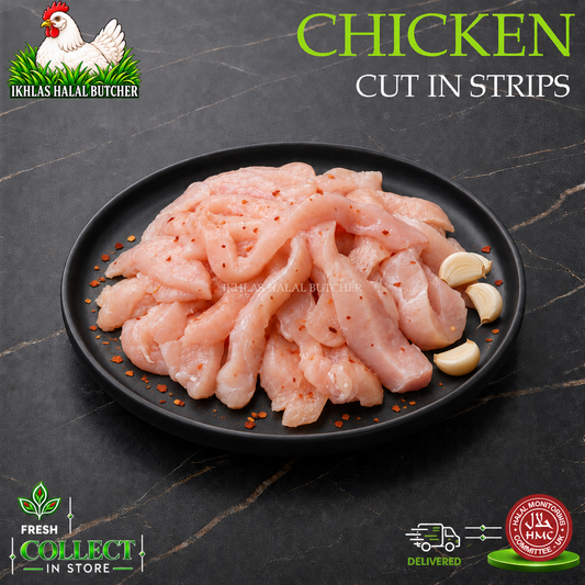 Raw sliced chicken cut in strips, seasoned with red pepper flakes, presented on a black plate with garlic cloves, set against a dark marble background with brand and delivery logos.