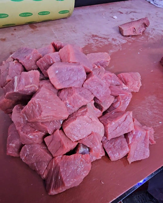 Halal lamb curry cut pieces on the butcher’s block, Ikhlas Halal Butcher, Bradford