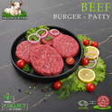 Halal beef burgers, with lemon and onion, on a black plate, Ikhlas Halal Butcher, Bradford