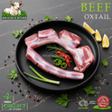 Halal ox tail, with lemon and chilli, on a black plate, Ikhlas Halal Butcher, Bradford