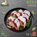 Halal ox tail, with parsley and chilli, on a black plate, Ikhlas Halal Butcher, Bradford