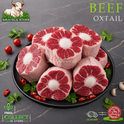 Halal ox tail, with parsley and garlic, on a black plate, Ikhlas Halal Butcher, Bradford