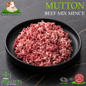 Raw minced beef mix from Ikhlas Halal Butcher displayed in a black bowl on a dark marble surface, with promotional text and logos including 'MUTTON BEEF MIX MINCE', 'IKHLAS HALAL BUTCHER', 'FRESH COLLECT IN STORE', and 'DELIVERED'.