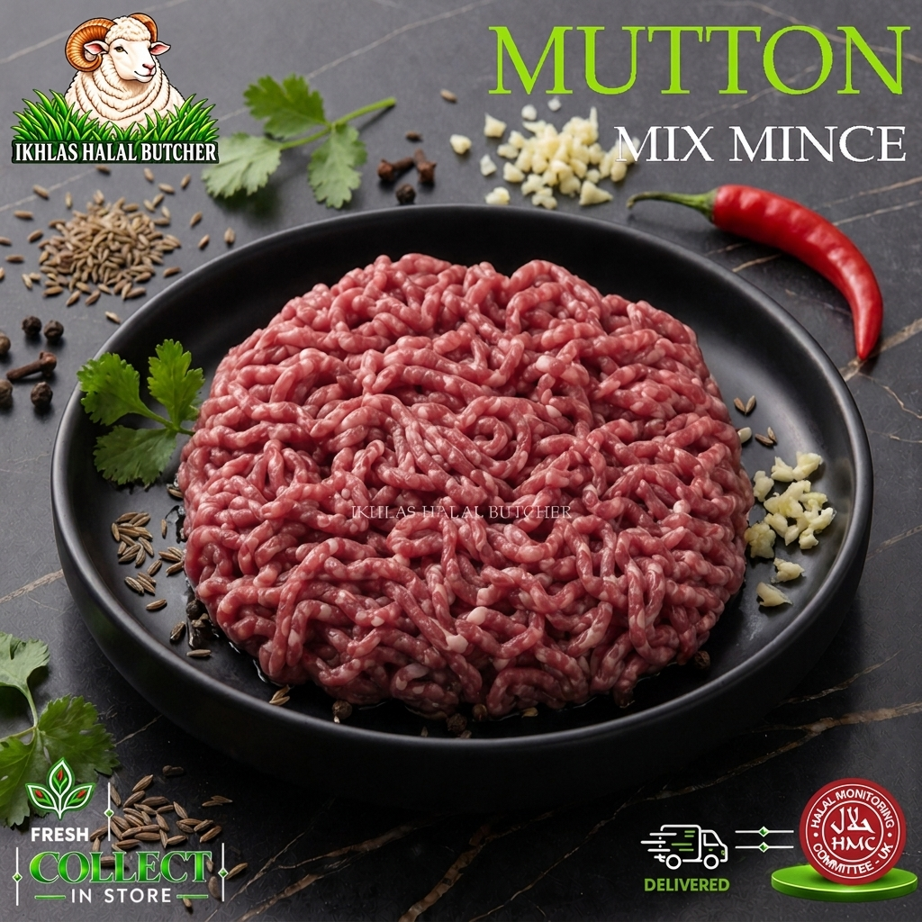 Raw ground meat mince presented on a black plate with branding text 'IKHLAS HALAL BUTCHER' and 'MUTTON MIX MINCE' on a dark textured background, surrounded by parsley, garlic, cumin seeds, peppercorns, and a red chili.