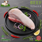 Halal beef tongue, with parsley and rosemary, on a black plate, Ikhlas Halal Butcher, Bradford