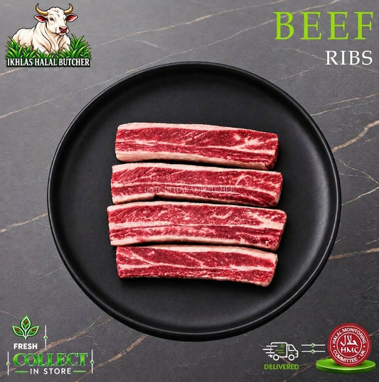 Halal beef ribs, on a black plate, Ikhlas Halal Butcher, Bradford