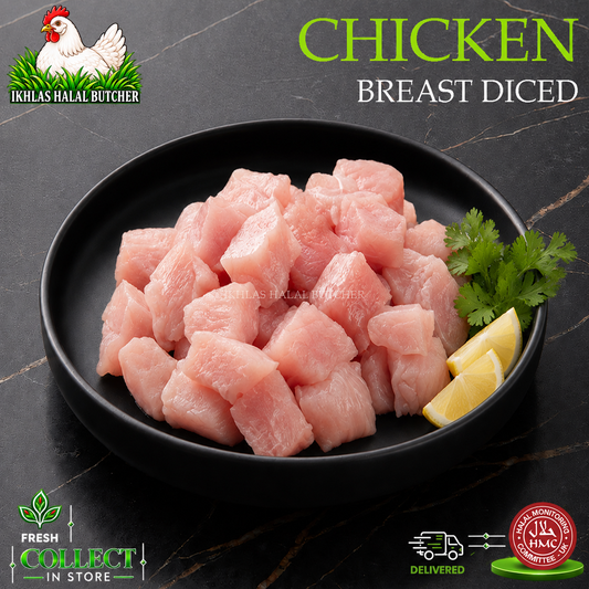 Halal diced chicken breast fillets, with lemon and parsley, on a black plate (photo 2), Ikhlas Halal Butcher, Bradford