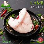 Halal lamb tail fat, with chilli and garlic, on a black plate, Ikhlas Halal Butcher, Bradford